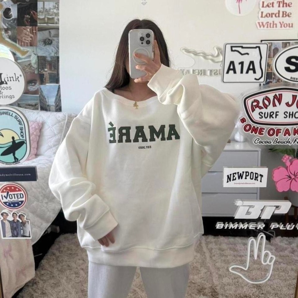 white amaré off the shoulder sweatshirt